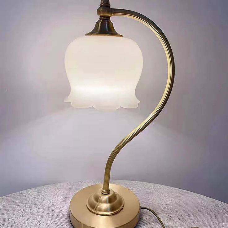 a lamp that is on top of a table