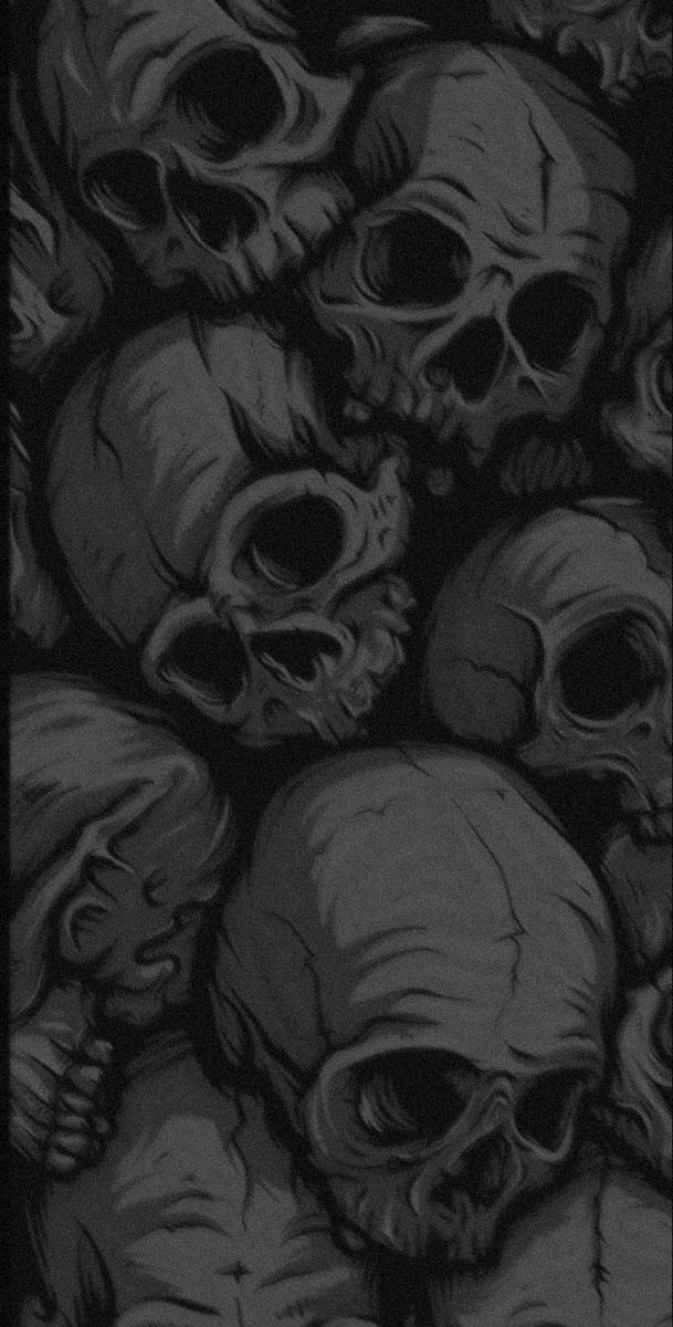 a bunch of skulls that are all in black and white