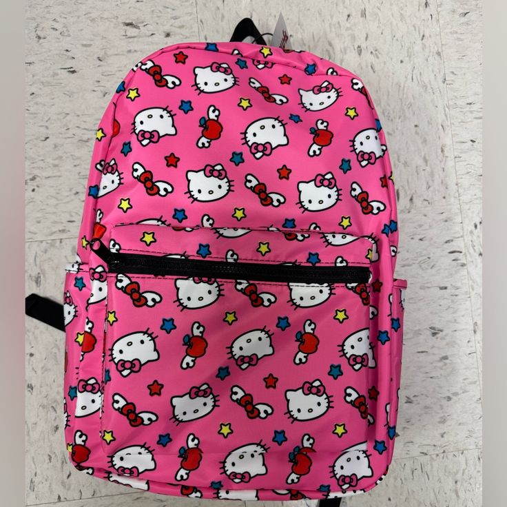 Hello Kitty Backpack Medium Size Pink Perfect For School Pink Hello Kitty Backpack For End Of School Year, Cat Design Backpack For Back To School, End Of School Year Pink Hello Kitty Backpack, End Of School Year Hello Kitty Pink Backpack, Cute Hello Kitty Print Backpack For School, Cute Hello Kitty Print Backpack For Back To School, Cute Hello Kitty Backpack For Back To School, Pink Hello Kitty Print Casual Backpack, Casual Pink Hello Kitty Backpack