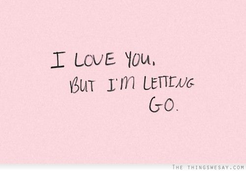 i love you, but i'm letting go written on a pink paper background