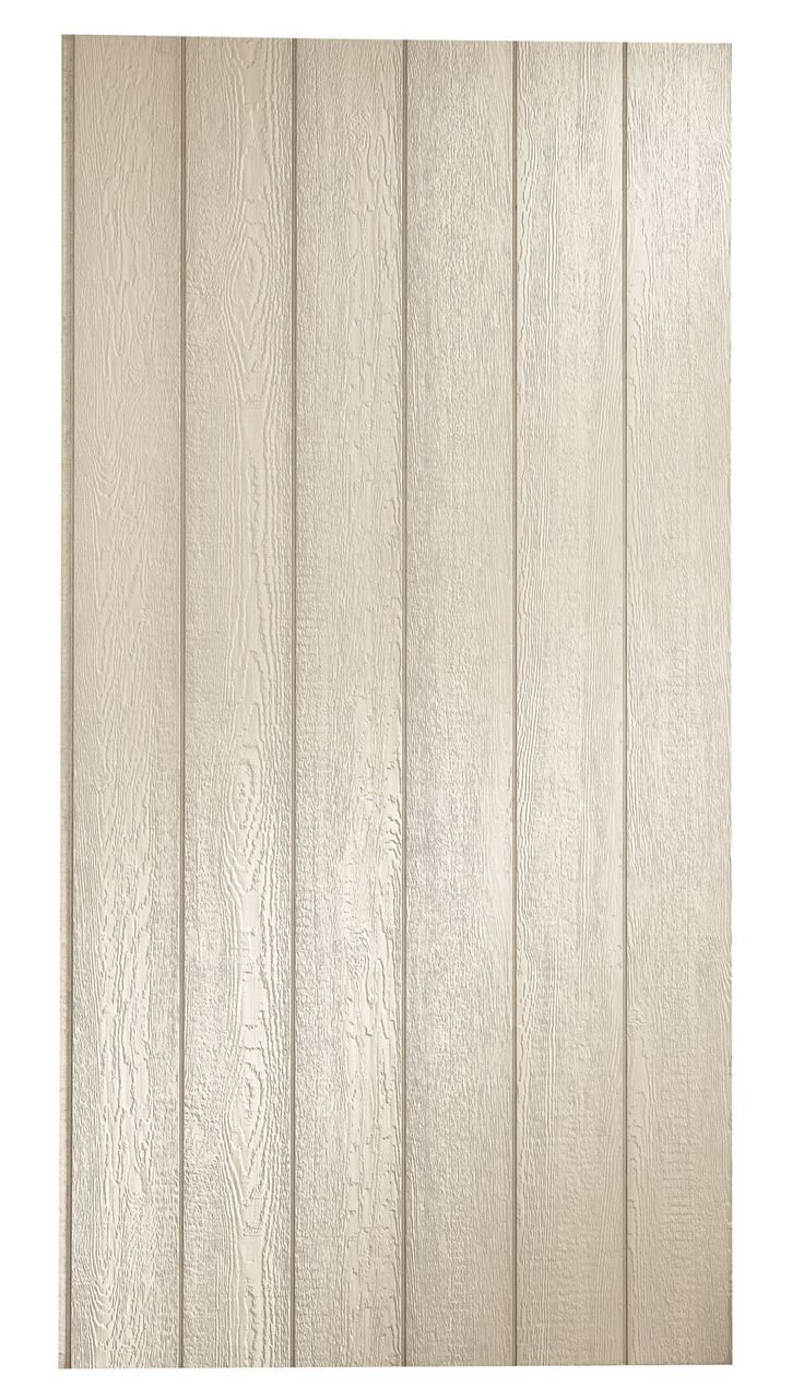 a white wood paneled wall with vertical slats