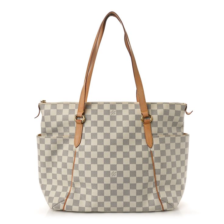 This is an authentic LOUIS VUITTON Damier Azur Totally MM. This stylish tote is crafted of Louis Vuitton signature damier coated canvas in blue and white. The shoulder bag features vachetta cowhide leather shoulder straps, polished brass hardware with bucket pockets on the sides, and opens to a beige fabric interior with patch pockets. Louis Vuitton Empreinte, Louis Vuitton Damier Azur, Lv Monogram, Beige Fabric, Louis Vuitton Shoulder Bag, Brass Hardware, Polished Brass, Authentic Louis Vuitton, Cowhide Leather