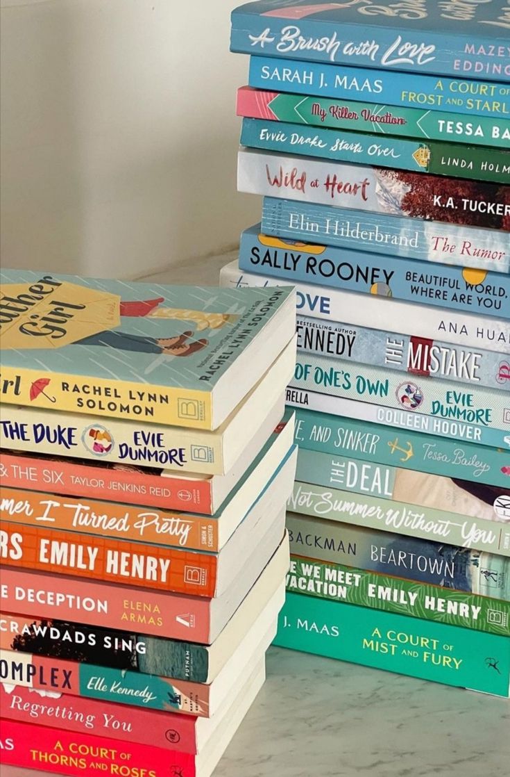 a stack of books sitting on top of a table