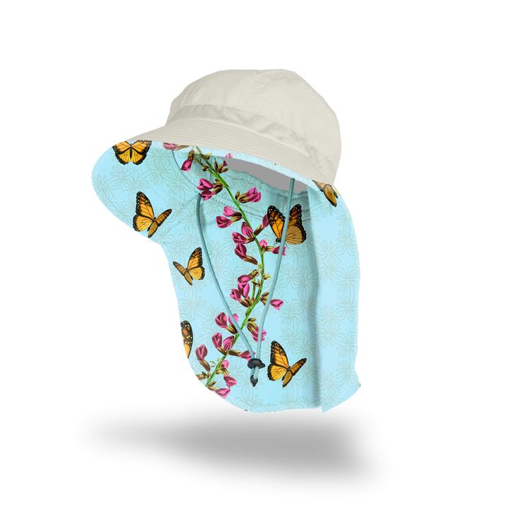 a child's sun hat with butterflies on it and a white brimmed cap