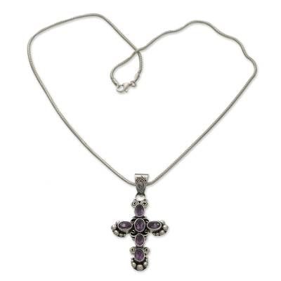 A sterling pendant consisting of six amethyst stones branches out in four directions forming a lovely cross. From Wayan Asmana the necklace melds the beautiful violet gemstone which represents February??s birthstone with silver to form an original design brimming with traditional Balinese sentiment. .925 Sterling silver Sterling Silver Necklace With Oxidized Cross Pendant, Purple Amethyst Cross Jewelry, Purple Amethyst Cross Necklace, Spiritual Cross Necklace With Large Pendant, Sterling Silver Spiritual Cross Pendant Necklace, Spiritual Sterling Silver Cross Pendant Necklace, Spiritual Cross-shaped Gemstone Necklace, Silver Cross Gemstone Necklace, Spiritual Cross Shaped Gemstone Necklace