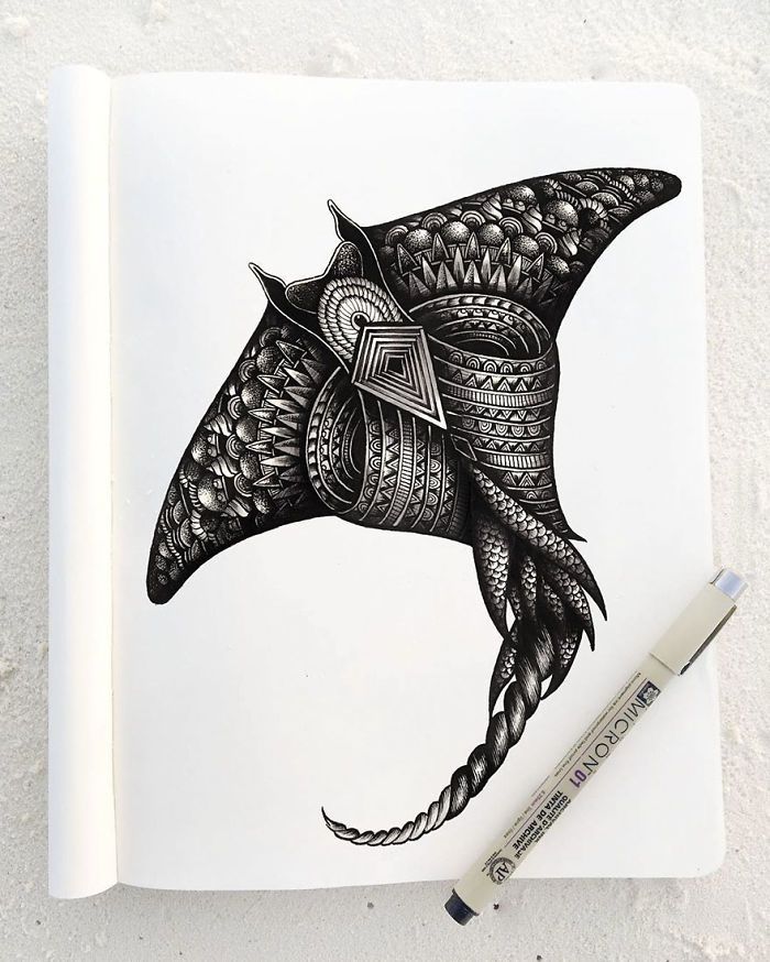 a black and white drawing of a bird wearing a helmet on it's head