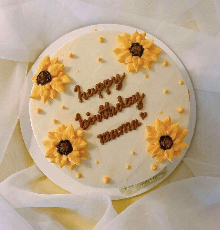 a birthday cake with sunflowers on it