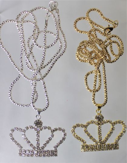 Gold or Silver Jewel Encrusted Crown Pendant, These crown necklaces are perfect for all royalty with all their rhinestones. They would make an exceptional gift for a fashionista. They are exquisite and would make an excellent charm or just as a collectible for the designer at heart. The are about 1.5 in x 2 in and they come with a 28" chain. Glamorous Alloy Necklace For Gift, Metal Rhinestone Necklace For Gift, Metal Necklace With Rhinestones For Gifts, Metal Necklaces With Rhinestones For Gifts, Dainty Metal Necklace With Rhinestones For Gift, Costume Jewelry With Rhinestones For Gifts, Crystal Rhinestone Necklace With Adjustable Chain, Metal Rhinestone Pendant Necklace, Party Pendant Rhinestone Necklace With Bling