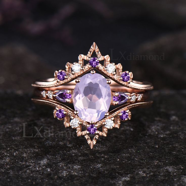 Item description ✦ Handmade, high-quality item! ✦ Material: 925 sterling silver, Solid 10k/14K/18K GOLD (can be made in white/rose/yellow gold) Engagement ring ✦ Center stone: Natural Lavender Amethyst. ✦ Size/Weight: 6x8mm Oval Cut ✦ Side stones: Pear Cut Natural Amethyst and Round Cut Moissanites Wedding band ✦ Gemstones: Round Cut Moissanites and Natural Amethyst Any ring size can be made,if the ring size is not in the option list ,contact me. As it is handmade,it needs 2-4 weeks to finish an Shiney Things, Amethyst Engagement Ring, Pretty Engagement Rings, Lavender Amethyst, Amethyst Ring Engagement, Cute Engagement Rings, Future Engagement Rings, Purple Rings, Dream Engagement Rings