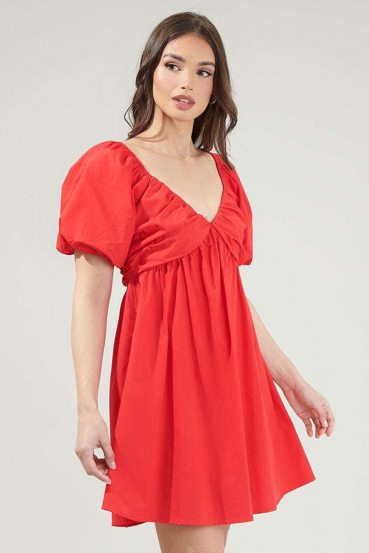 Luck is sure to come your way whenever you wear the Leandra Poplin Mini Dress! This dress is a certified charmer with its short puff sleeves, open back and deep v-neckline. It has elastic throughout the edges. Wear your red or black heels to match and you’re all set go! - Bubble Sleeves- Zipper- Lined- Mini- Comes in 2 colorsSize + Fit - Model is 5'8" and wearing size XS- Measurements taken from size S - Chest: 18 1/2"- Length: 28 1/2" Fabric Self:100% Cotton Lining:97% Polyester 3% Spandex Styl Red Dress Sleeves, Red Or Black, Linen Style, Red Mini Dress, Dance Dresses, Mini Black Dress, Black Heels, Puff Sleeves, Open Back