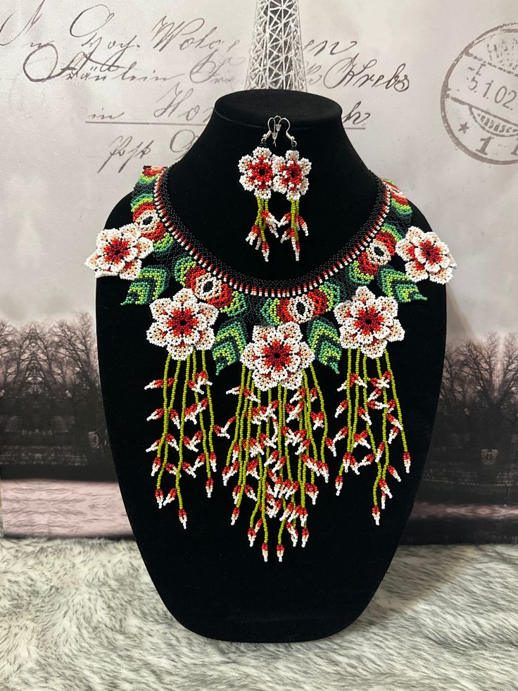 All our pieces are genuine and each necklace is handcrafted by artisans from the most representative areas of Huichol art. We only have one piece of each style, choose the option or style that you like and only choose 1 quantity, thank you. Handmade White Bohemian Necklaces, Unique Necklace With Dangling Beads For Gift, Gift Necklaces With Dangling Beads, White Bohemian Jewelry Sets For Jewelry Making, Multicolor Hand Painted Jewelry For Festivals, Artisan Necklace With Dangling Beads For Gift, Unique White Necklaces For Crafting, Bohemian White Jewelry Sets For Gift, Handmade Multicolor Jewelry Sets For Gifts