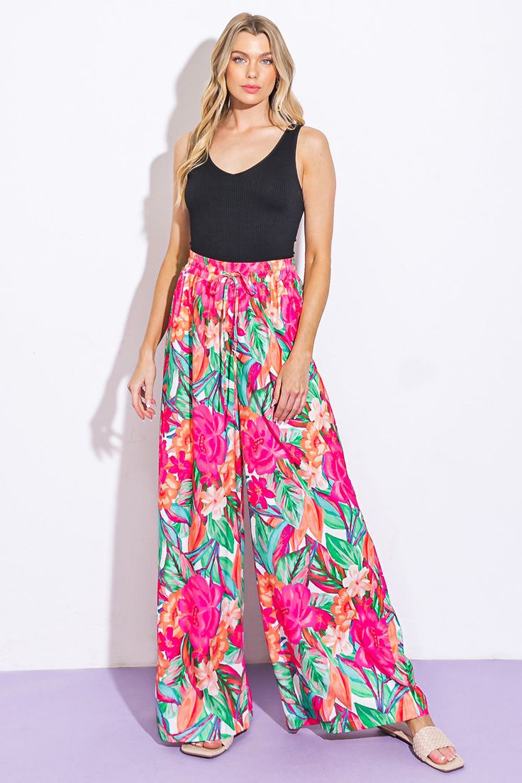 A printed woven pant featuring elasticized waist with tie and wide leg. Matching top IT13077Details:Self : 100% PolyesterSize & Fit- Model is 5`8" And Wearing Size Small- Measurements Taken From Size Small- Approx. Length: 46" Pink Wide Leg Pants For Vacation, Spring Day Out Printed Wide Leg Pants, Printed Wide Leg Pants For Spring Day Out, Summer Pants With Elastic Waistband In Pink, Summer Pink Pants With Elastic Waistband, Pink Summer Pants With Elastic Waistband, Trendy Summer Wide Leg Pants With Tie Waist, Trendy Wide Leg Pants With Tie Waist For Summer, Printed Wide Leg Pants For Spring Loungewear