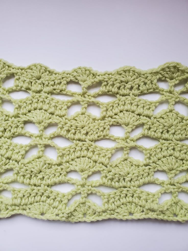 the crochet is green and has holes in it