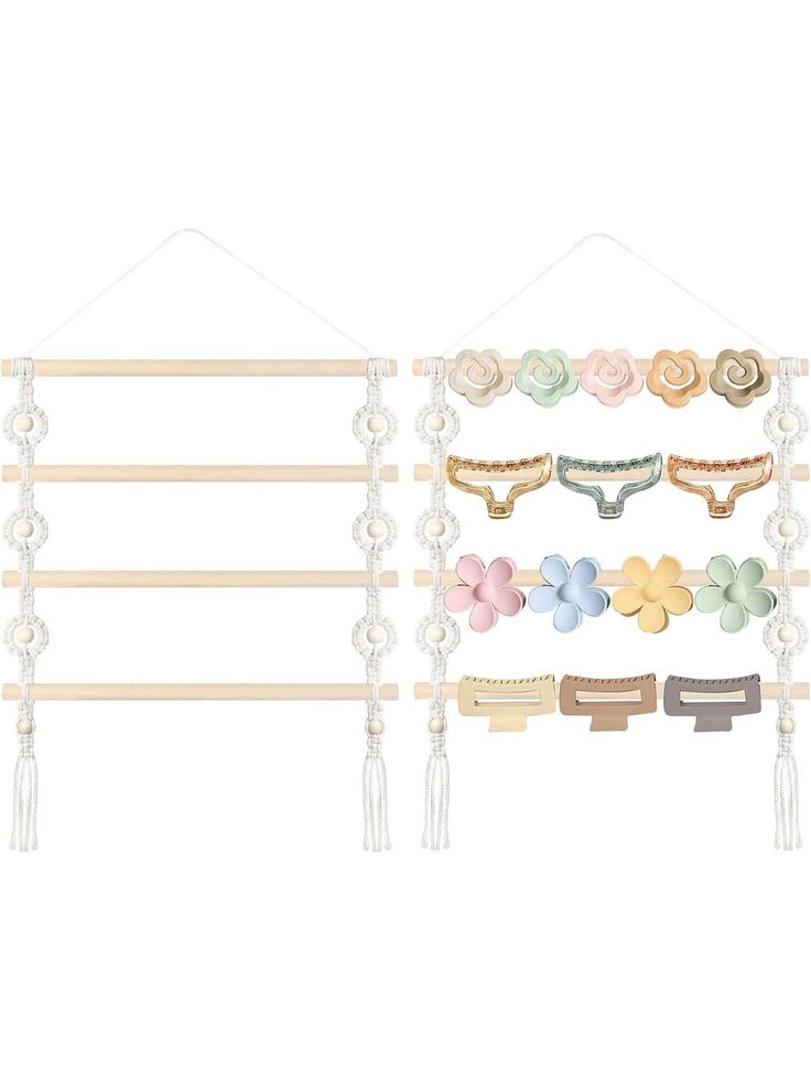 an assortment of hair clips hanging on a wall with beads and pearls attached to it