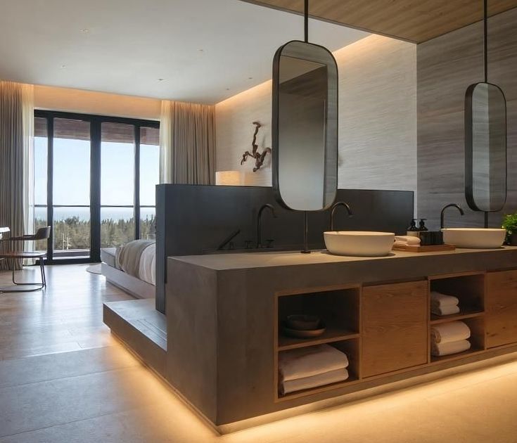 a large bathroom with two sinks and mirrors on the wall, along with an open window