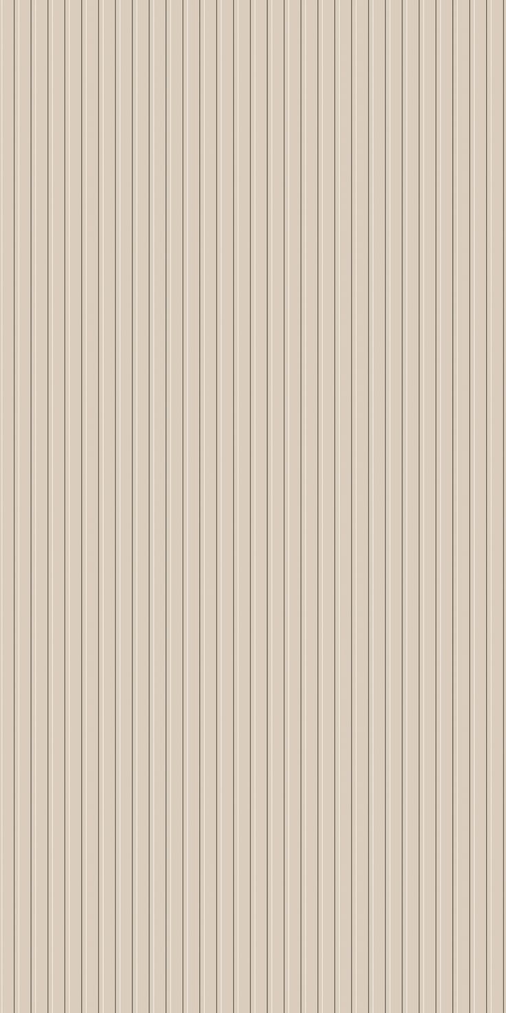 a beige striped wallpaper with vertical lines