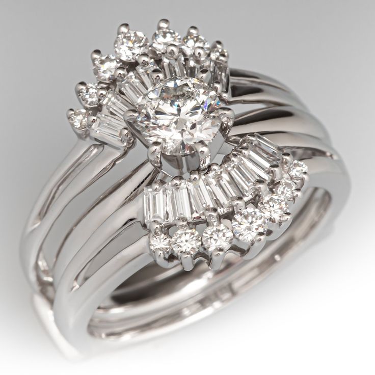 a white gold diamond ring set with baguetts