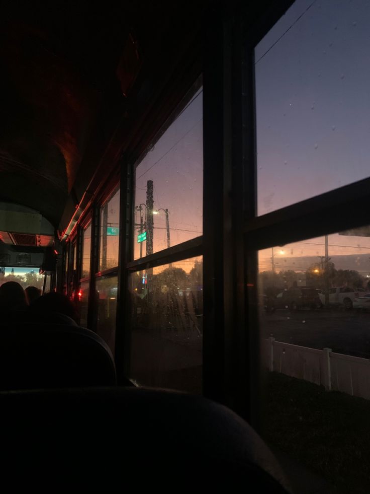 the view from inside a bus at night