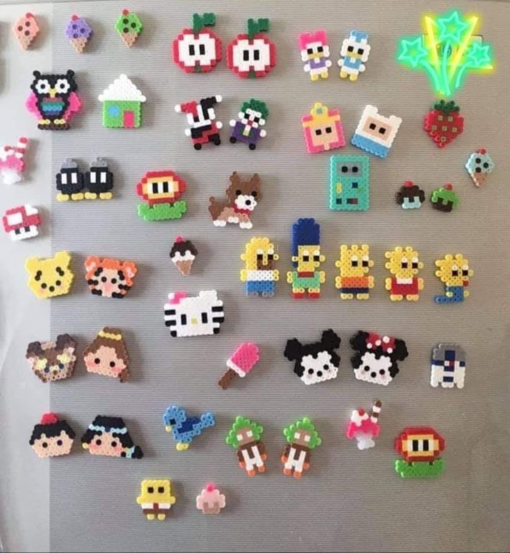 a refrigerator with many different types of magnets on it