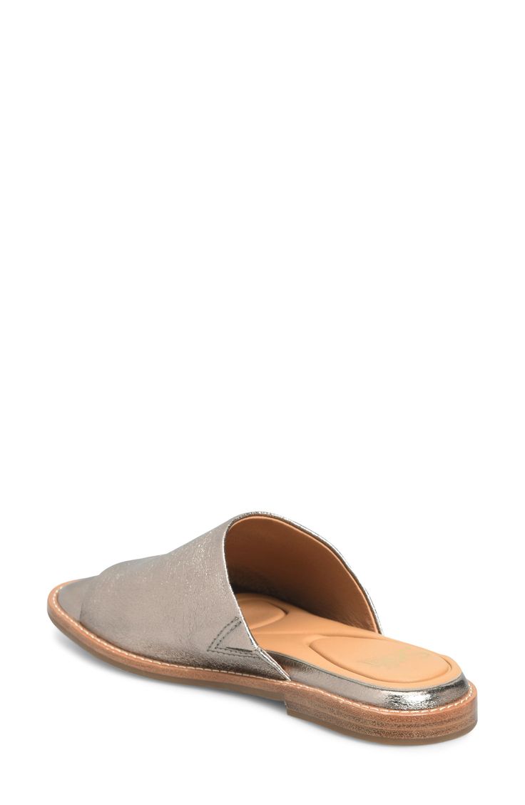 This laidback slide sandal is summertime-ready with a cushioned footbed lined in breathable leather. Cushioned footbed with arch support Leather upper and lining/synthetic sole Imported Comfortable Slip-on Mules With Textured Footbed, Beach Slip-ons With Cushioned Footbed And Flat Heel, Synthetic Open Toe Mules With Cushioned Footbed, Summer Slip-on Flats With Arch Support, Synthetic Open Toe Mules With Textured Footbed, Summer Flat Heel Slip-ons With Ortholite Insole, Slip-on Flats With Arch Support For Summer, Casual Slip-on Slides With Textured Sole, Summer Ortholite Insole Closed Toe Slip-ons