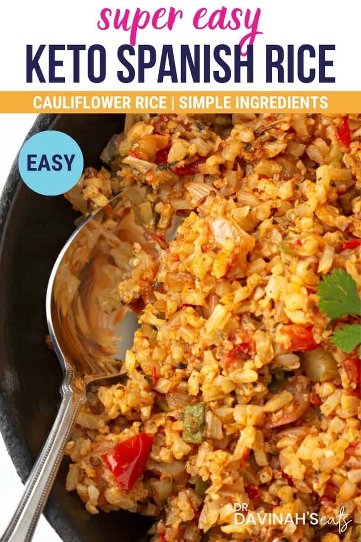 a bowl filled with rice and vegetables next to a spoon on top of the bowl