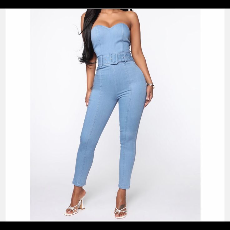 Light Blue Stretch One Piece With Back Zipper With Detachable Belt Trendy Blue Denim Jumpsuit For Day Out, Chic Blue Cotton Denim Jumpsuit, Trendy High-waist Denim Jumpsuit For Day Out, Chic High-waist Denim Jumpsuits And Rompers, Trendy High Waist Denim Jumpsuit For Day Out, Casual Denim Blue Jumpsuit For Night Out, Chic Denim High Waist Jumpsuits And Rompers, High Waist Denim Jumpsuit For Night Out, Fitted Denim Blue Jumpsuit For Day Out