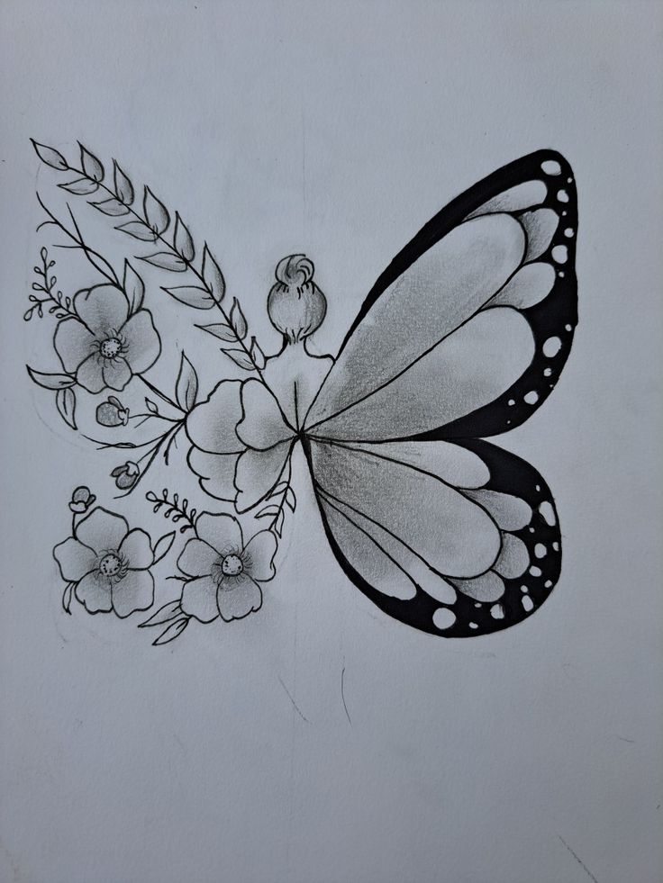 a black and white drawing of a butterfly with flowers on it's back side