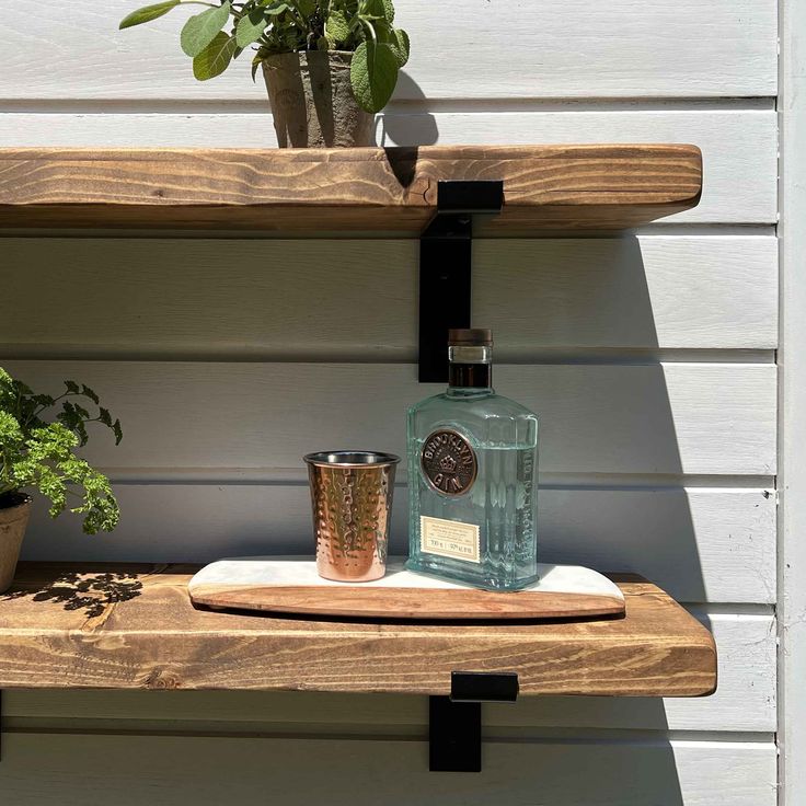 All our rustic shelves are manufactured from environmentally sustainable solid wood. We include fixings, metal legs and fitting instructions with every order. Choose from a wide range of size and colour options. 3-5 working day lead time with FREE DELIVERY! Lifetime Guarantee. Outside Wood Storage, Garden Wall Shelves, Outdoor Shelving Ideas, Home Cocktail Bar, Outdoor Shelves, Bracket Shelf, Herb Garden In Kitchen, Plasterboard Wall, Metal Shelf Brackets