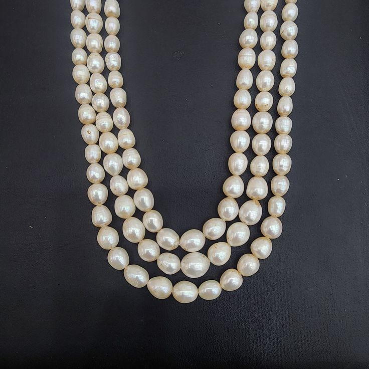 Enhance your style with this Three-Strand Pearl Necklace, featuring lustrous pearls in a classic layered design. Ideal for both formal and everyday wear, this piece adds a touch of timeless elegance to any ensemble. Material : Natural pearls & adjustable thread Classic Pearl Necklace With Polished Beads, Formal Polished Pearl Necklace, Classic Pearl Necklaces With Polished Beads, Formal Pearl Necklace With Polished Beads, Classic Polished Pearl Necklace For Wedding, Formal Single Strand Pearl Bridal Necklace, Classic Wedding Pearl Necklace With Polished Beads, White Polished Pearl Necklace For Formal Occasions, Formal Pearl White Bridal Necklace With Pearl Drop