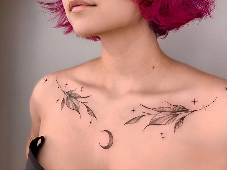 a woman with pink hair and tattoos on her chest