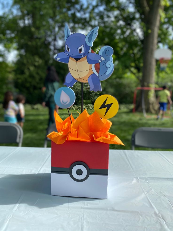 a pokemon themed centerpiece on top of a table