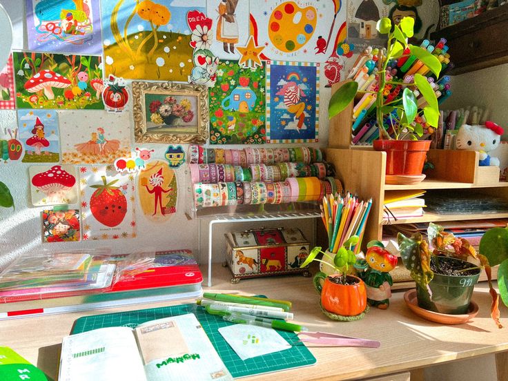 the desk is full of art and craft supplies for children to use in their homes