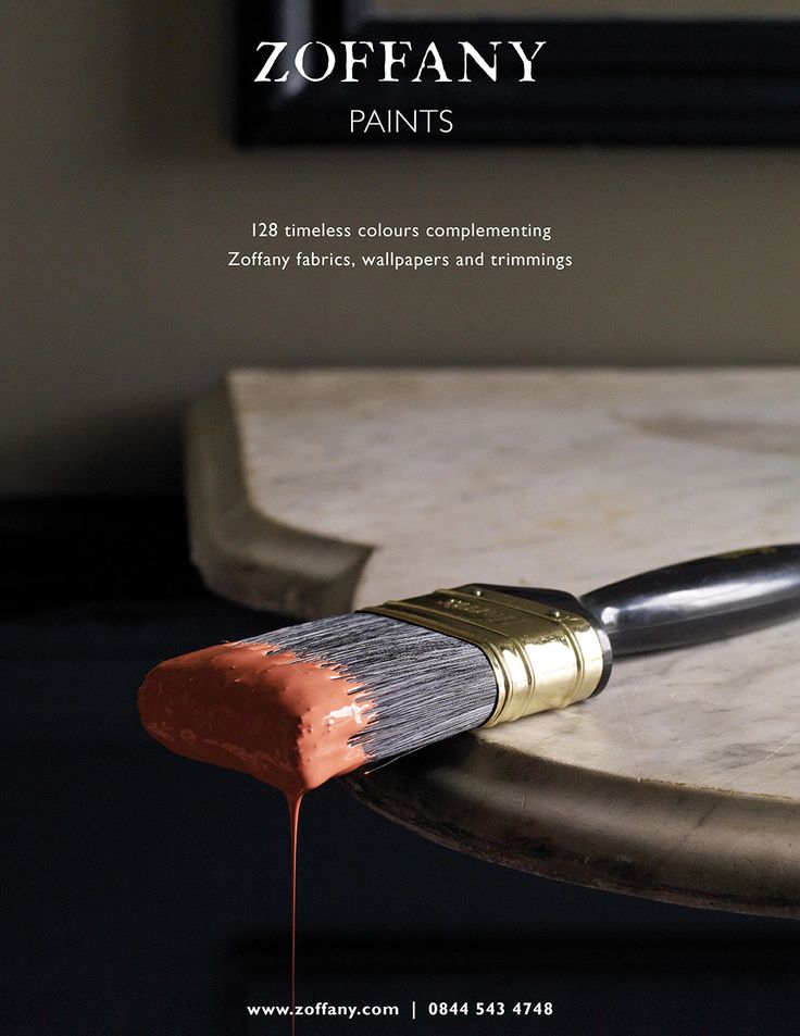 a close up of a paint brush on a table with the words zoffany paints