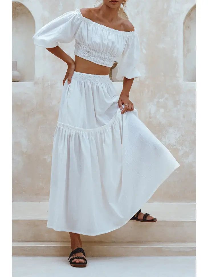 Our handcrafted Annabelle maxi skirt is infused with the bohemian flair and is designed for unforgettable picture-perfect coastal getaways. Crafted from soft and luxurious organic crinkle linen into a high-waist two-tier floaty silhouette it is detailed with miniature folds and has an elasticated waistband for easy on and off. Style annabelle maxi skirt with the matching annabelle crop top and a pair of slides for a perfect coastal style. -Content: 100% linen -Hand wash cold -Elasticated high-ri Little Black Dress Outfit, Linen Maxi Skirt, Linen Crop Top, Crop Top Designs, Bachelorette Dress, Casual Bodysuit, Rush Dresses, Linen Crops, Black Dress Outfits