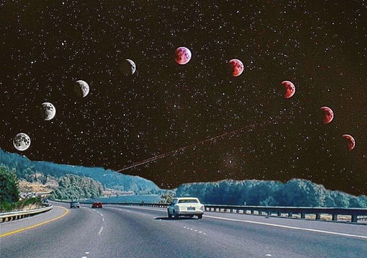 a car driving down a road with the moon in the sky and planets above it