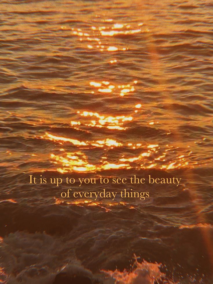 the sun is setting over water with an inspirational quote on it that reads, it is up to you to see the beauty of everyday things