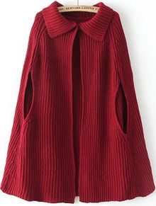 a red sweater with an open front and zippers on the side, hanging from a hanger