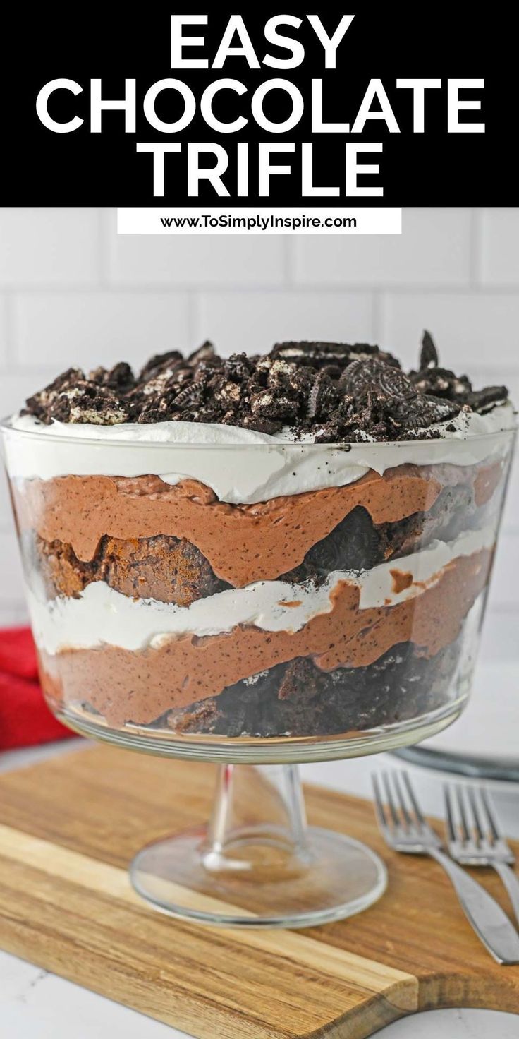 an easy chocolate trifle in a glass dish on a wooden cutting board with the title overlay