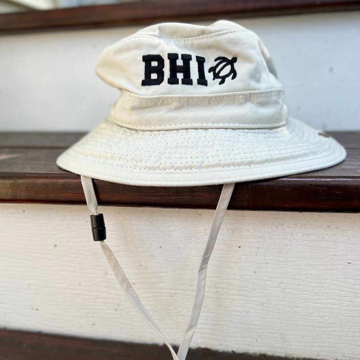 Sun protection meets fun and style with our BHI Embroidered Monogram UPF Boonie Youth Bucket Hat. This cool hat for kids features soft yet durable garment-washed-twill fabric for easy-wearing comfort and durability. A mesh lining promotes faster drying and cooling breathability. The boonie style gives all-around coverage with UPF 50 sun protection to shield against harsh rays. A breakaway chin cord feels comfy while keeping the hat in place. Cotton Durable & ideal for wear in the great outdoors Adjustable Cotton Sun Cap, Wide Brim Hat With Embroidered Logo For Outdoor, Cotton Wide Brim Hat For Streetwear, Wide Brim Cotton Hat For Streetwear, Adjustable Cotton Sun Hat, Adjustable Fit Cotton Bucket Hat With Wide Brim, Adjustable Cotton Wide Brim Sun Hat, Adjustable Fit Cotton Brimmed Bucket Hat, Adjustable Cotton Bucket Hat With Curved Brim