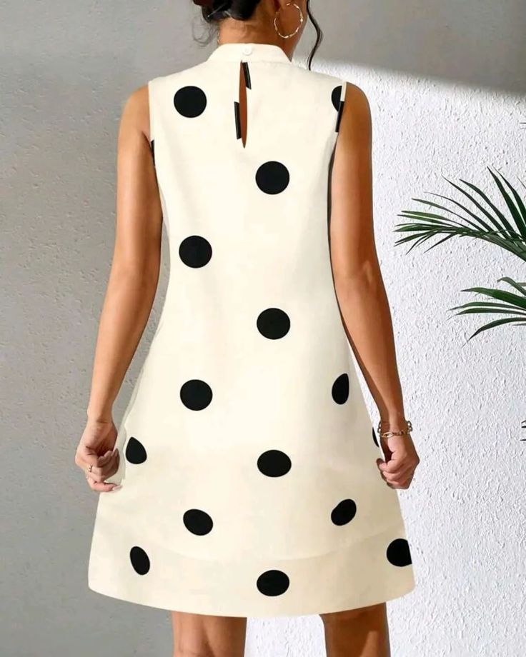 This gorgeous Polka Dot Round Neck Sleeveless Dress is the perfect choice for an elegant evening. Its simple silhouette is timeless and elegant, with a classic neckline and whimsical polka dot pattern. The fabric is delicate and lightweight, ideal for a warm summer night. Make a chic statement at your next event and turn heads in this sophisticated dress. Chic A-line Polka Dot Dress, Summer Polka Dot Sleeveless Knee-length Dress, Knee-length Polka Dot Sleeveless Summer Dress, Casual Polka Dot Sleeveless Party Dress, Casual Polka Dot Sleeveless Dress For Party, Elegant Polka Dot Knee-length Mini Dress, Polka Dot Sleeveless Dress For Summer Party, Polka Dot Sleeveless Summer Party Dress, Chic Polka Dot Sleeveless Summer Dress