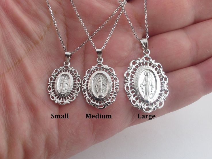 "A fabulous 14k white gold Virgin Mary charm pendant necklace!!  Cable Chain: by 1.1 mm thick with lobster clasp.  Material: 14k solid gold, Stamped on the clasp, Not plated. Small size measurements: 3/4\" long not including the bail by 5/8\" wide or 20 x 15 mm Length and avg weight: 16\"= 2.90  g 18\"= 3.20  g 20\"= 3.50 g Medium size measurements: 1\" or 24 mm long not including the bail by little over 5/8\" or 17 mm wide 16\"= 4.40 g 18\"= 5.00 g 20\"= 5.60 g  Large size measurements: 1\" or Silver Oval Sterling Silver Charm Necklace, Silver Sterling Oval Charm Necklaces, Oval Silver Sterling Silver Charm Necklaces, White Gold Pendant Charm Necklace With Lobster Clasp, Nickel-free White Gold Classic Necklaces, Silver Charm Necklaces In Fine Jewelry Style, Nickel-free Classic White Gold Necklaces, Nickel-free White Gold Classic Necklace, Classic White Gold Necklace Nickel-free