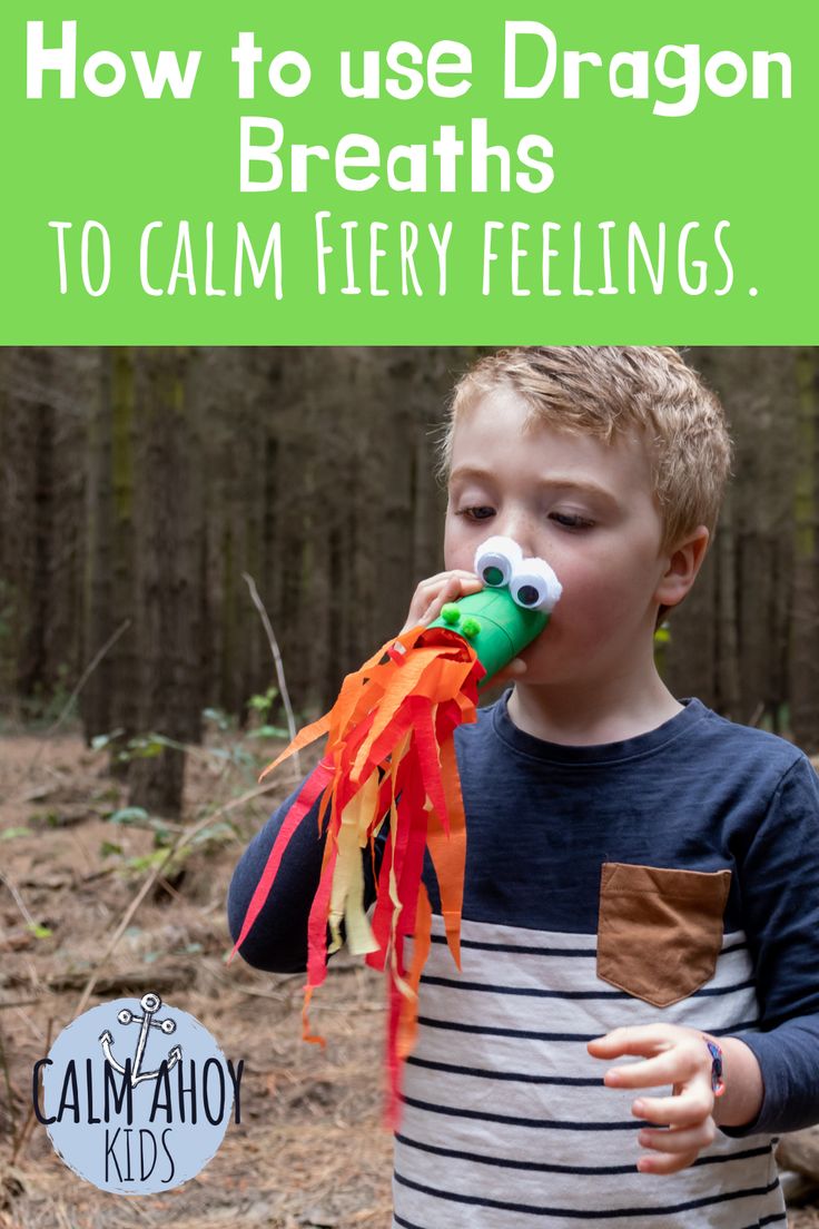 a young boy holding a toy in his mouth with the words how to use dragon breaths to calm fiery feelings