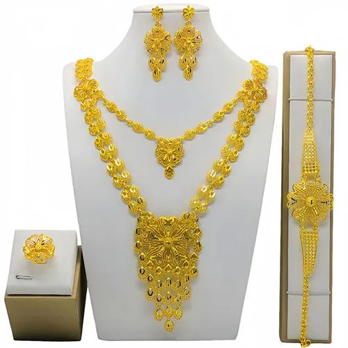 Indulge in luxury with this exquisite Dubai Gold Necklace Set, perfect for wedding parties. With its opulent design and superior craftsmanship, this set features a necklace, bracelet, earrings, and ring. Make a lasting impression and elevate your style with this luxurious jewelry set.' Dubai Gold Bracelet, Dubai Gold Necklace, Dubai Gold Jewelry, Luxurious Jewelry, Gold Bracelet Set, Jewelry Tags, Gold Necklace Set, Wedding Parties, Necklace Bracelet