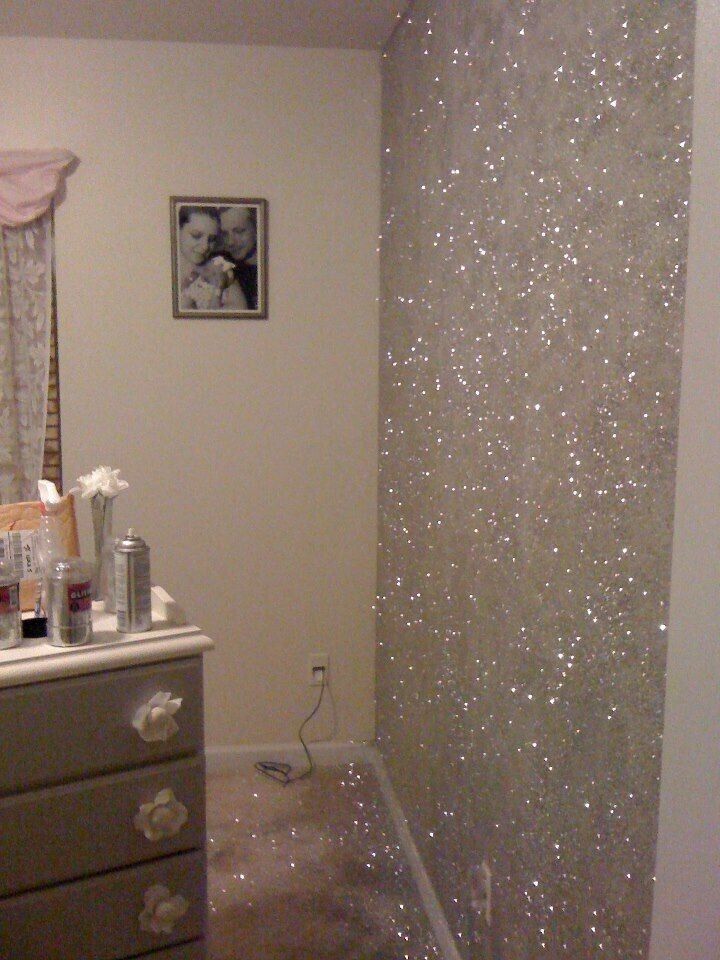 a bathroom with glitter on the walls and a bathtub in the middle of the room