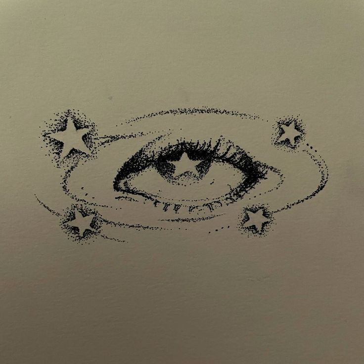 a drawing of an eye with stars in the middle and one star at the bottom