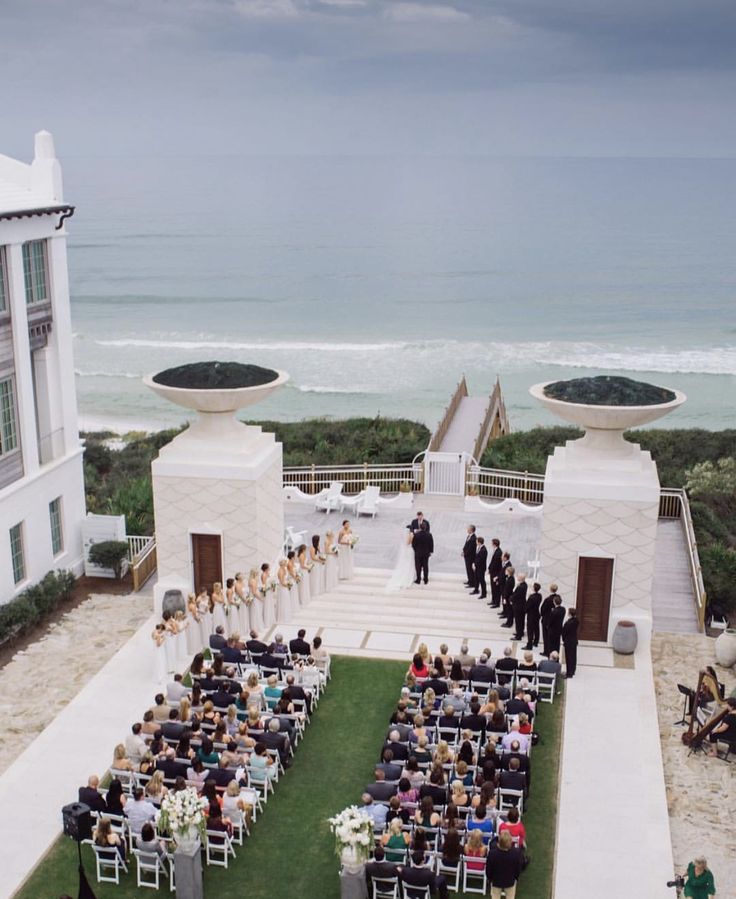 an aerial view of a wedding ceremony at alys beach in san diego, california