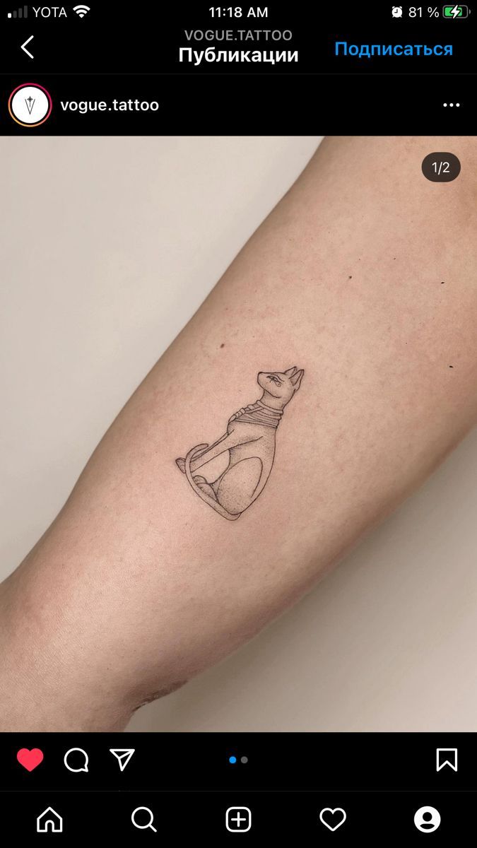 a woman's arm with a bottle tattoo on it