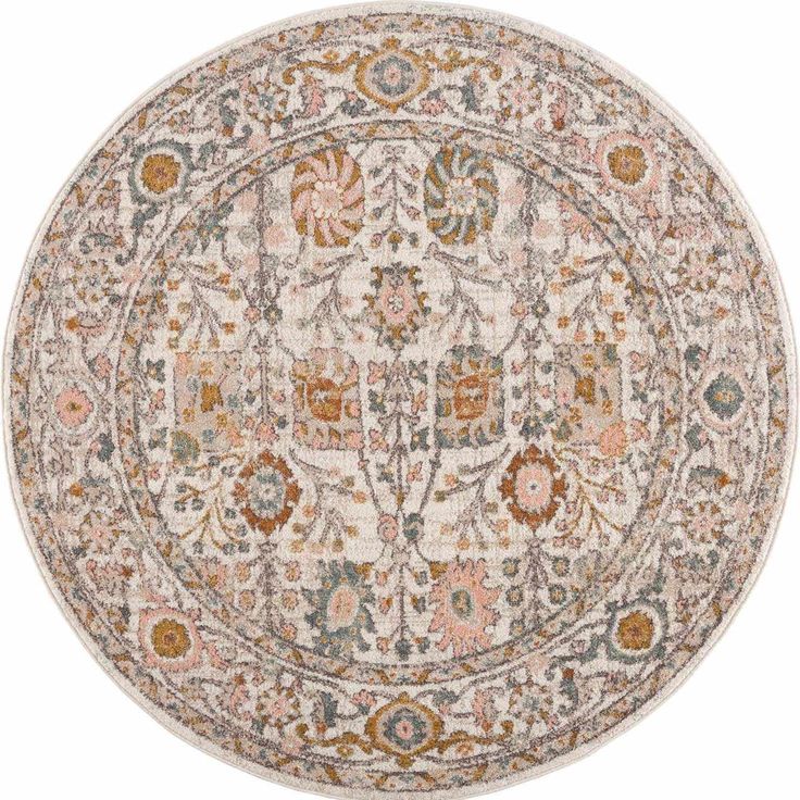 a round rug with an ornate design on the center and bottom in beige, blue, orange