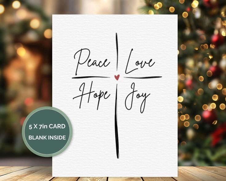 a card with the words peace love hope joy on it and a christmas tree in the background