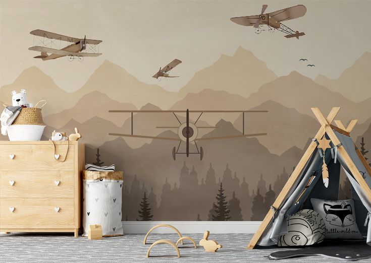 a child's room with an airplane mural and teepee tent in the foreground